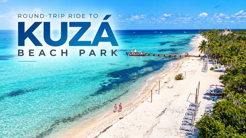 Round-trip private ride to KUZA Beach Park in Cozumel: white sand beach, pier and turquoise water seen from above